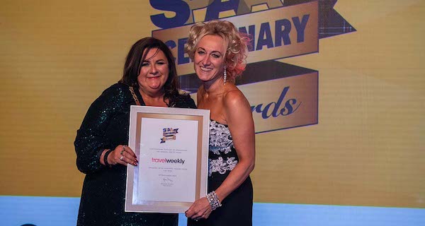 Joanne Dooey, chair of the Scottish Passenger Agents’ Association, presents the award to Travel Weekly Lucy Huxley, editor-in-chief of Travel Weekly, for Travel Weekly's outstanding support as an SPAA partner and for supporting the awards for 25 years.