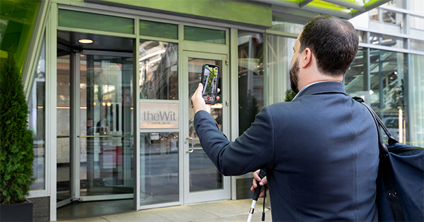 Hilton-and-Be-My-Eyes-Launch-Industry-First-Partnership-Navigating-Hotel-Entrance