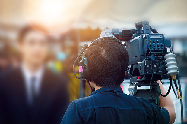 Video,Cameraman,Working,With,His,Crew.,Concept,Behind,The,Scene