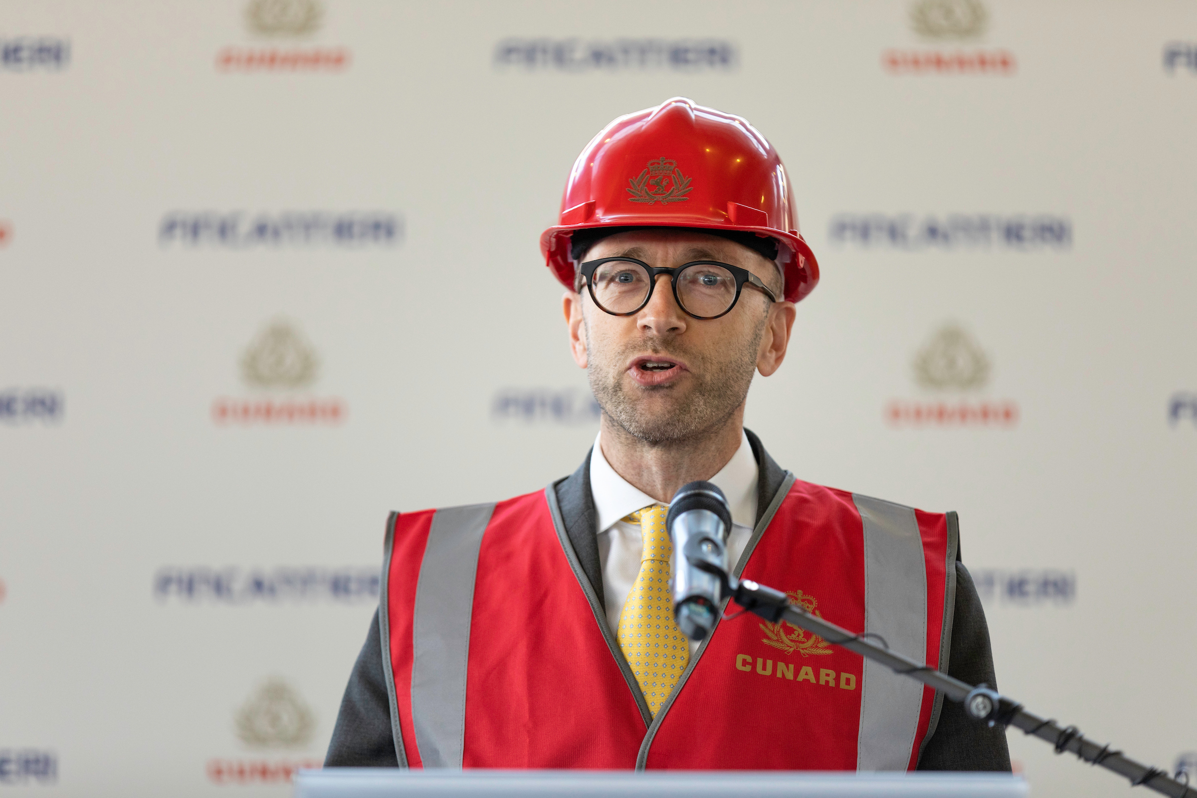 EDITORIAL FREE TO USE IMAGE - Simon Palethorpe, President of Cunard speaking at the Fincantieri ship yard in Naples, Italy where Cunard has cut the first steel of their new, as yet un-named, ship which will launch in 2022. The start of construction on the 249th ship of the luxury cruise line, marks an exciting moment in the companys 179-year history. Cunard's fleet includes Queen Mary 2, the world's only ocean liner in service, plus Queen Elizabeth and Queen Victoria. Picture date: Friday October 11, 2019. Photograph by Christopher Ison © 07544044177 chris@christopherison.com www.christopherison.com