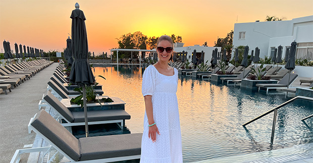 Cathy at Cali pool sunset 2