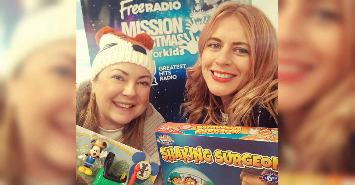 Holidaysplease staff pack Christmas gifts for underprivileged children